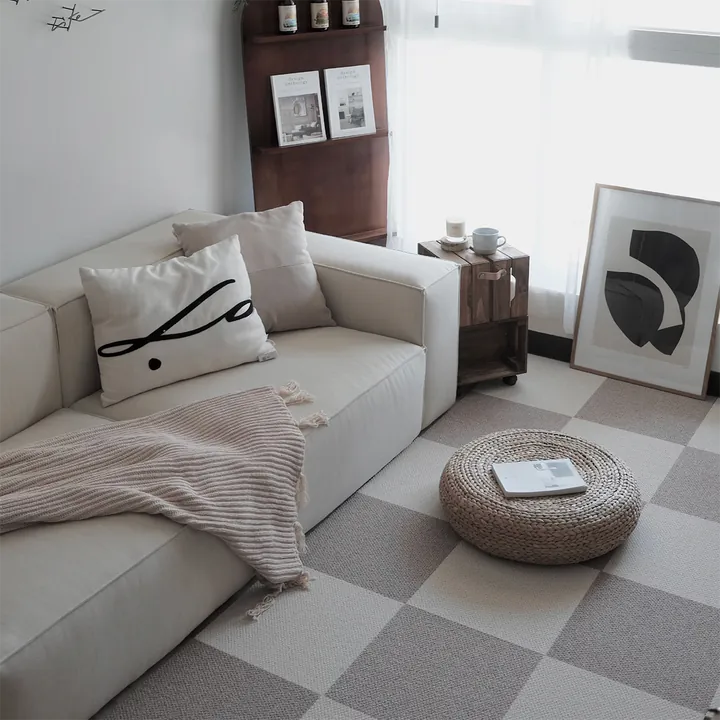 TOLI modular carpet tile checker rug in a warm living room