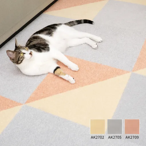 TOLI AK27 removable carpet tiles arranged as a colorful home rug